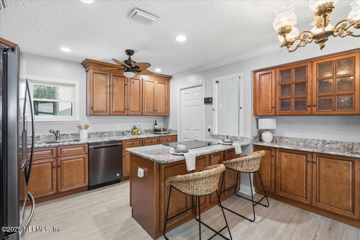 4447 Cedar Road Orange Park, FL 32065 - Photo 19 of 100 a kitchen that has a sink and a stove in it