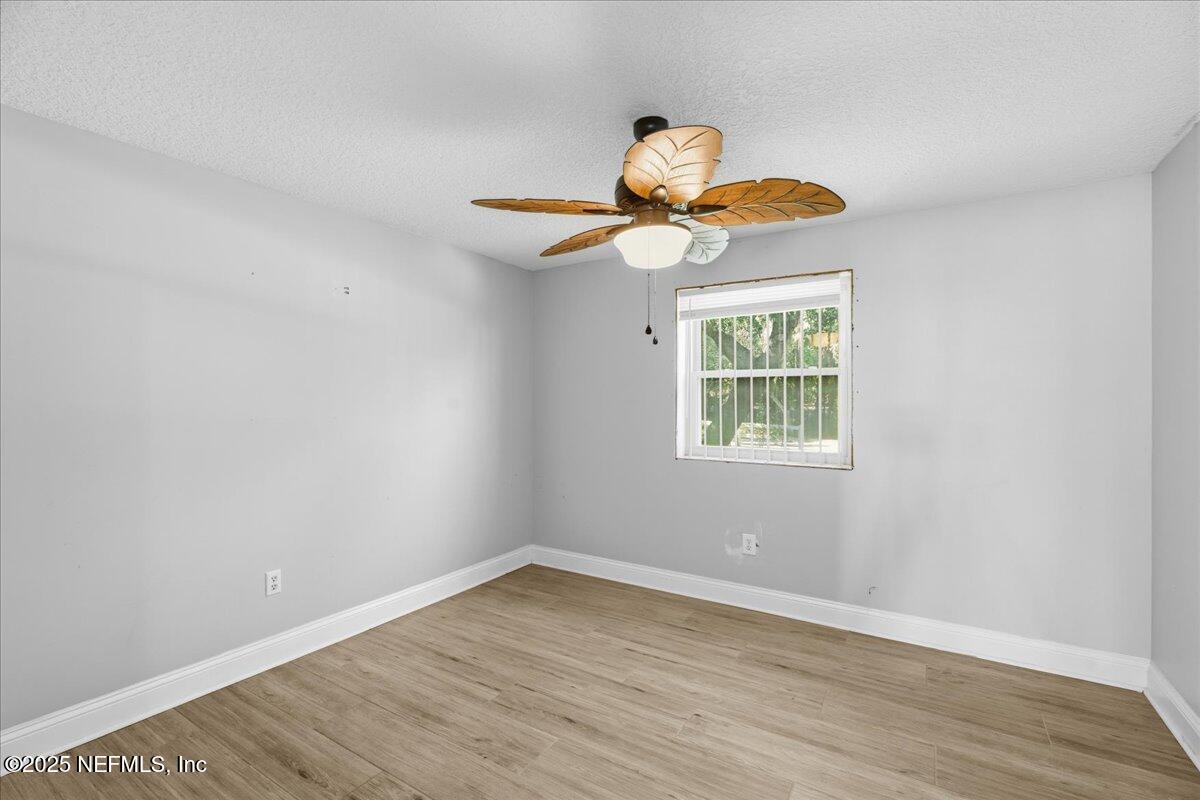 4447 Cedar Road Orange Park, FL 32065 - Photo 48 of 100 a view of a room with wooden floor and window