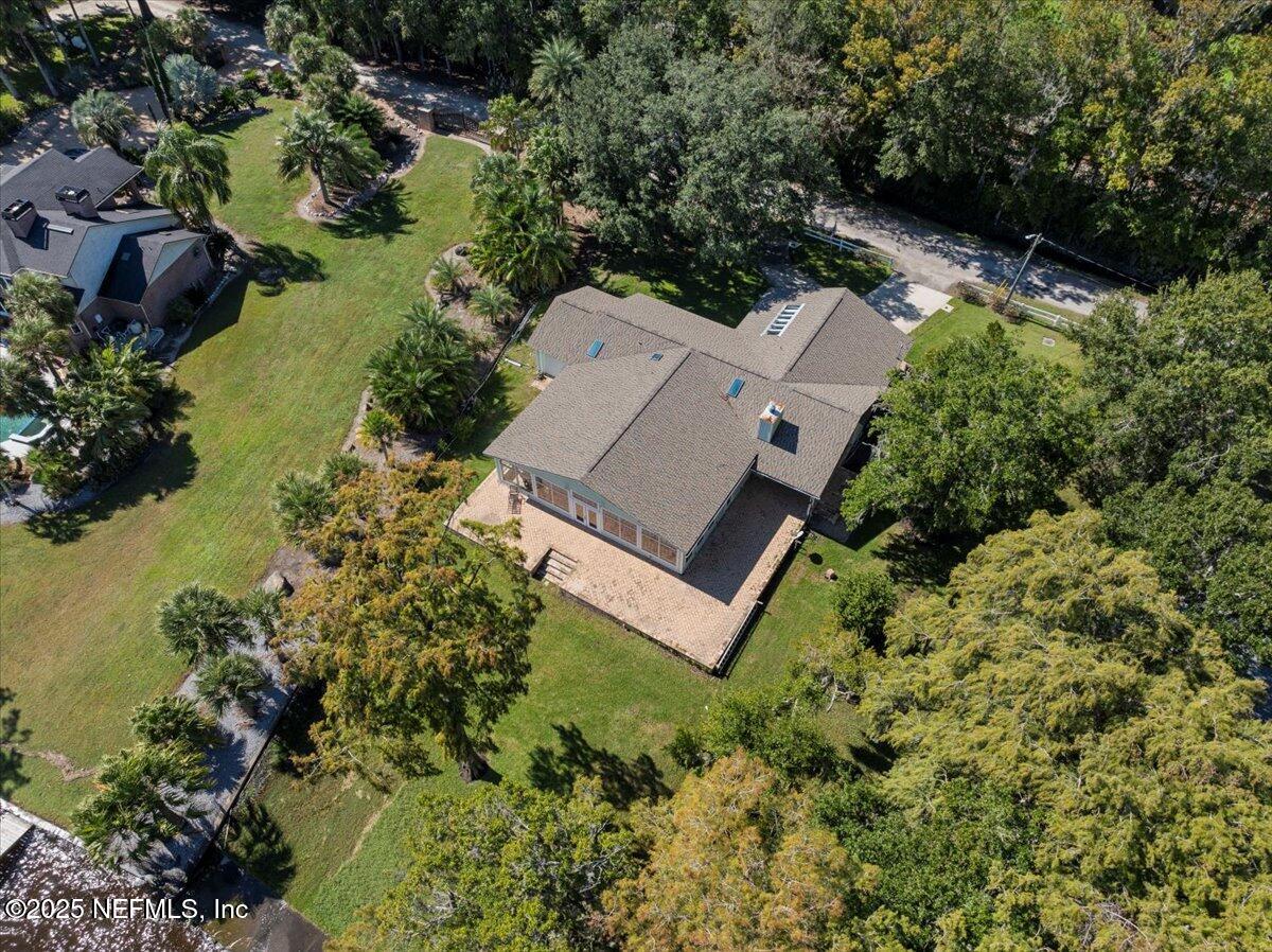 4447 Cedar Road Orange Park, FL 32065 - Photo 82 of 100 an aerial view of house with yard and outdoor seating