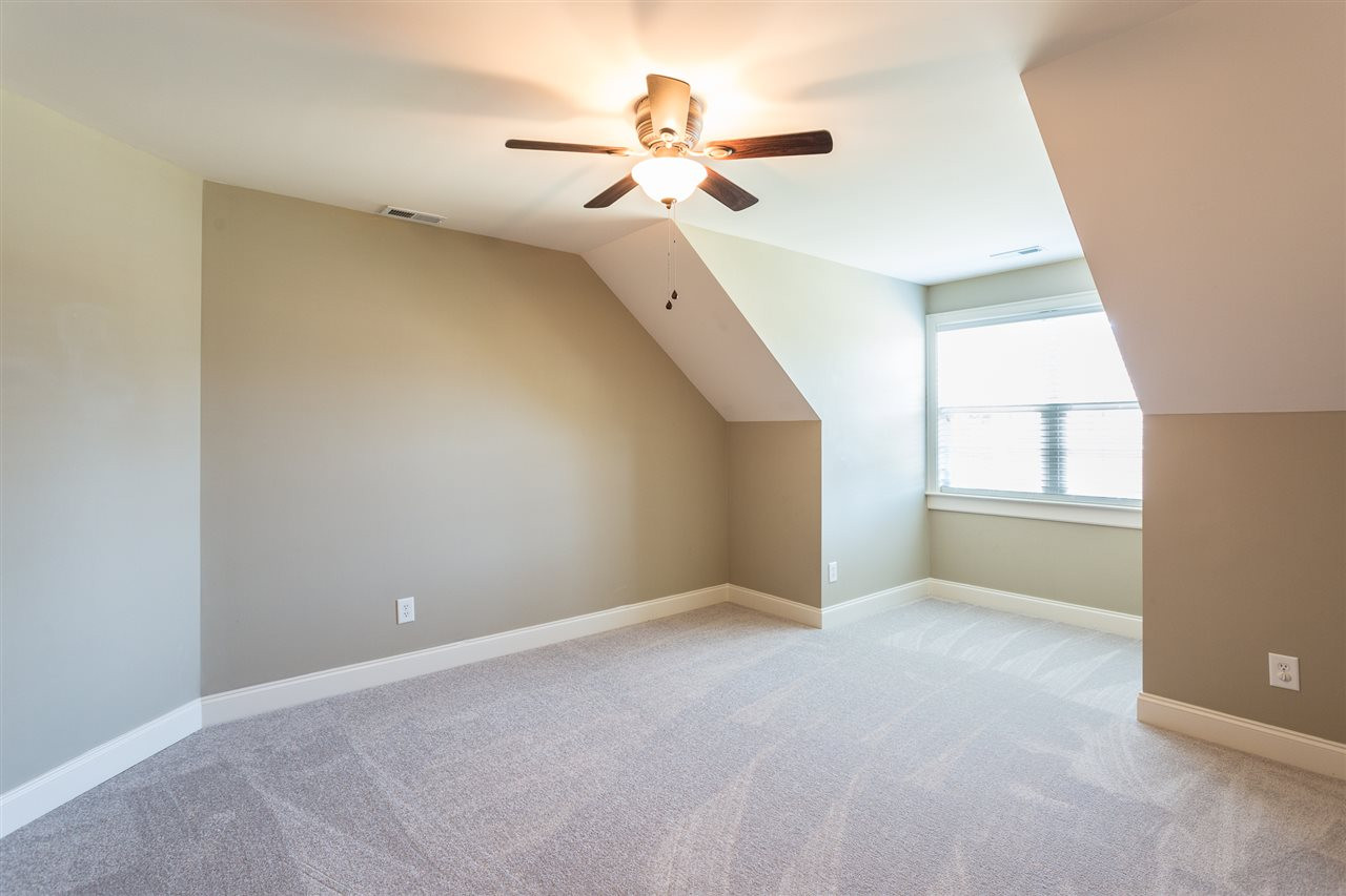 12 Vista Ridge Drive Willow Spring, NC 27592 - Photo 21 of 30 This second floor bedroom awaits your personal touches and furnishings to make it your own. Room features new carpet, smooth ceilings with fan and light kit, and a walk-in closet with wood shelving. Bedroom