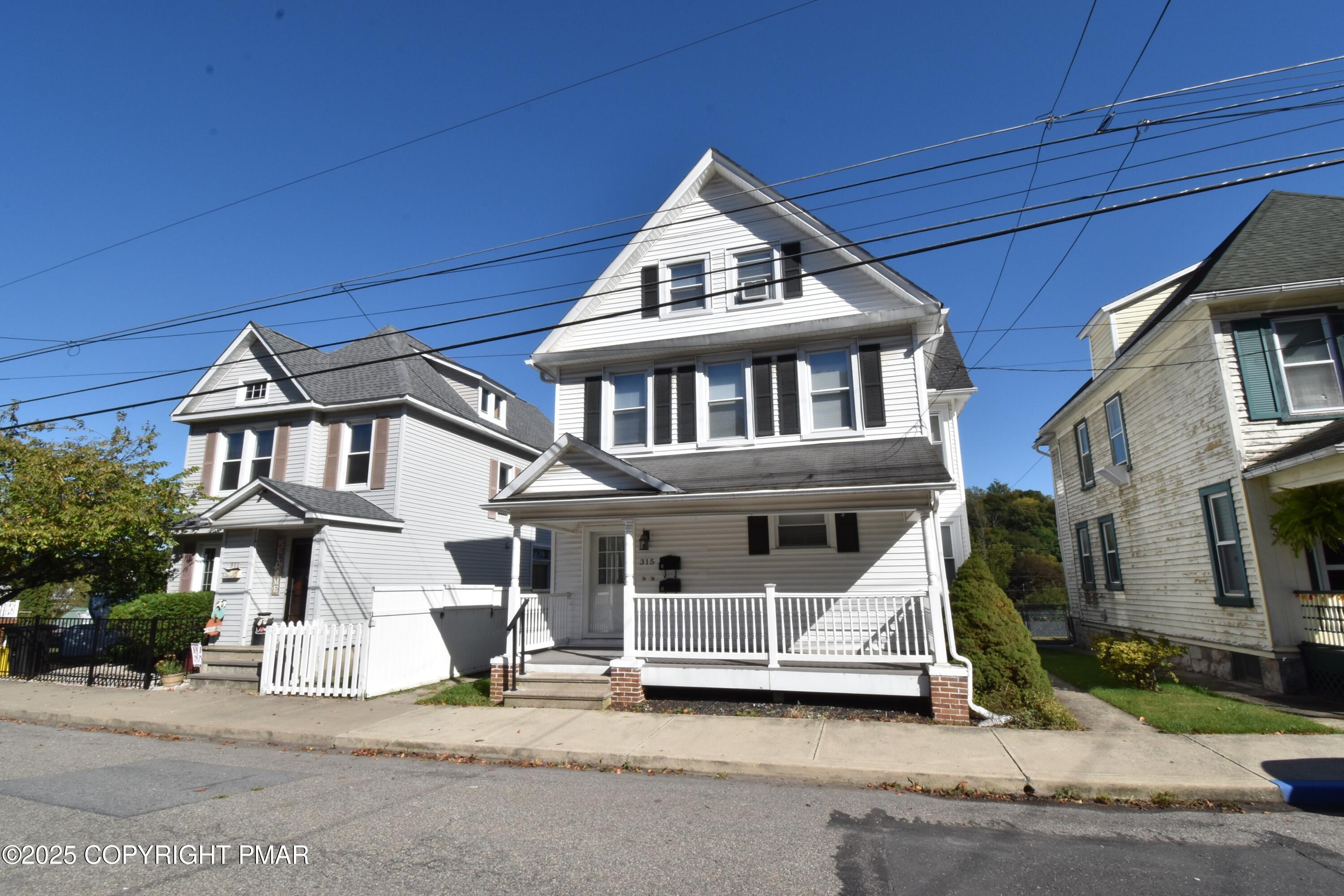 315 South 2nd Street Bangor, PA 18013 - Photo 1 of 27 a front view of a house with a garden