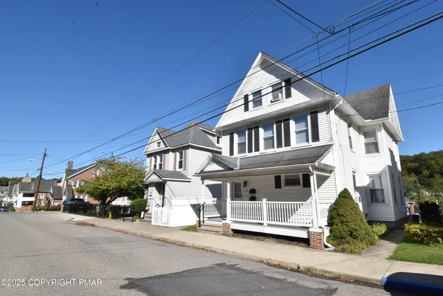 a car parked in front of a building