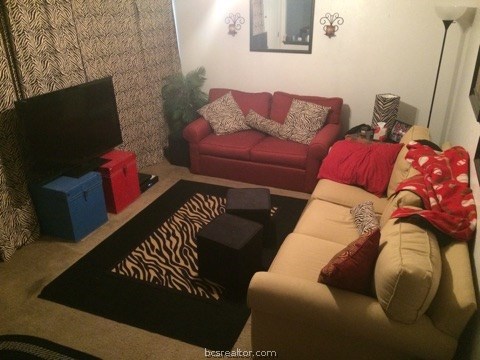 a living room with furniture