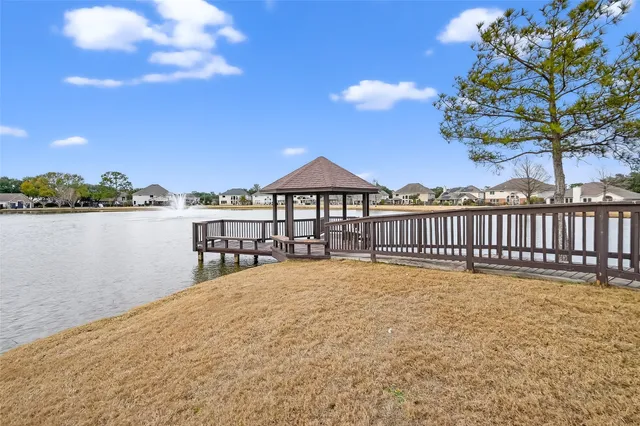 a view of a garden with a lake