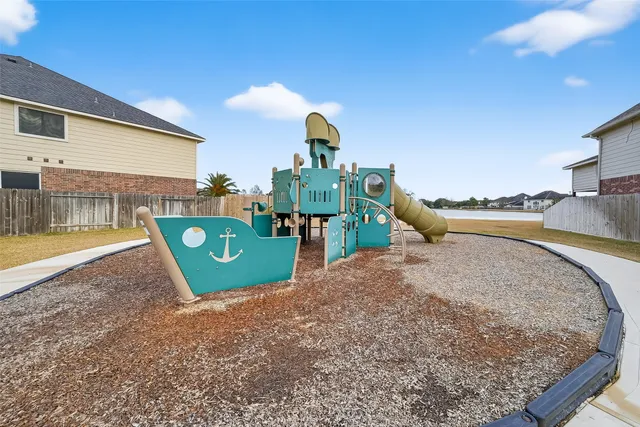 a view of a swimming pool with a lounge chairs