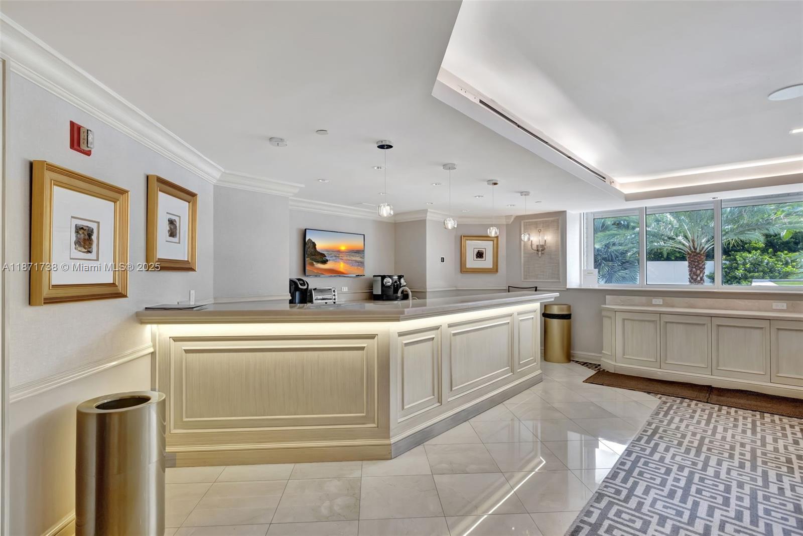 2600 East Island Boulevard, Unit 1503 Aventura, FL 33160 - Photo 34 of 36 a large white kitchen with a window