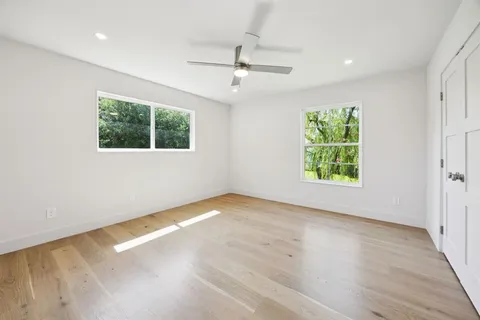 an empty room with windows