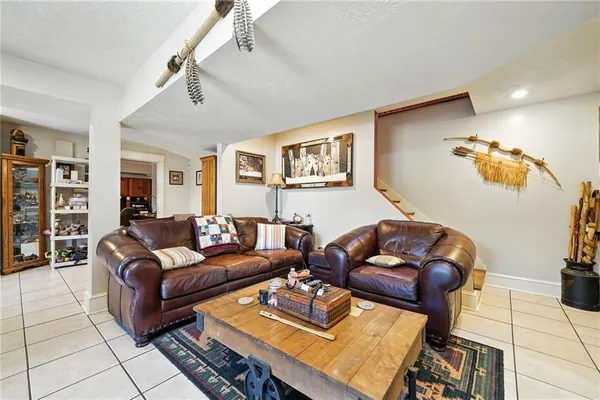 a room with gym equipment and large window