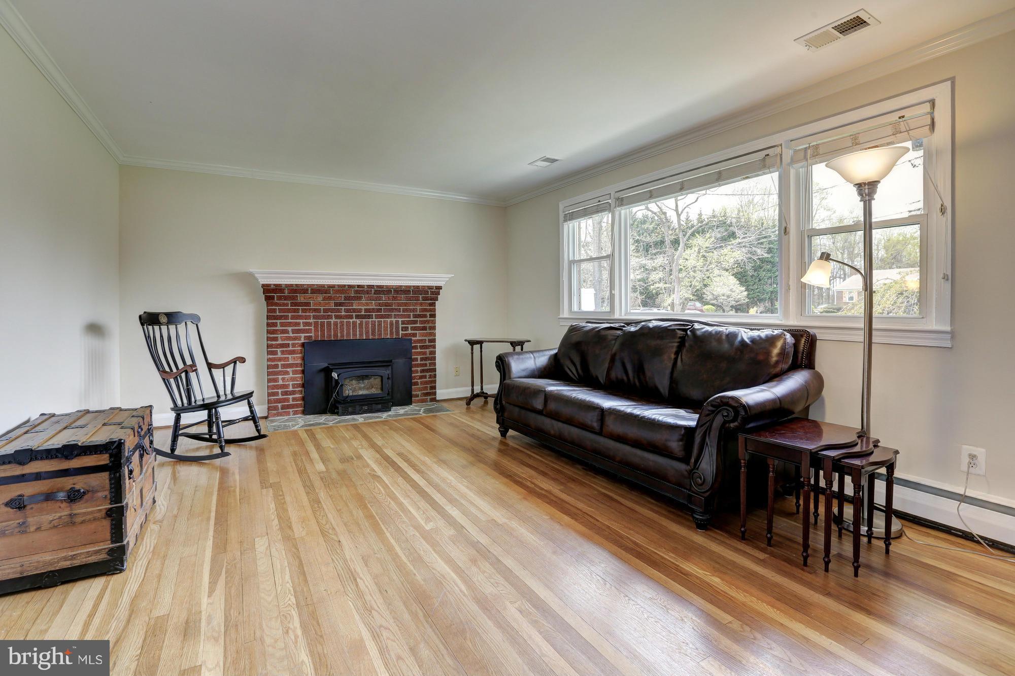 16921 Oak Hill Road Silver Spring, MD 20905 - Photo 11 of 30 Light filled living room