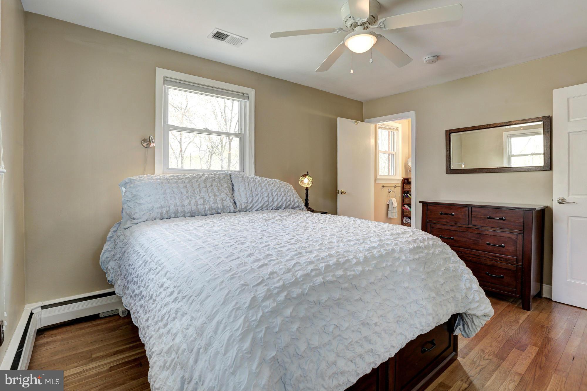 16921 Oak Hill Road Silver Spring, MD 20905 - Photo 14 of 30 Master bedroom with en suite bathroom