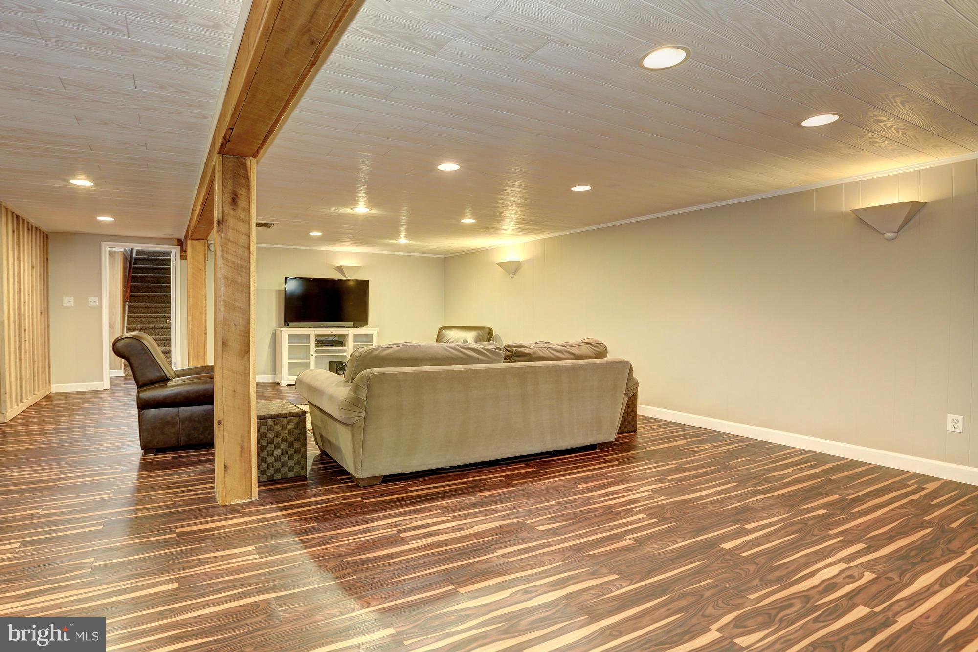 16921 Oak Hill Road Silver Spring, MD 20905 - Photo 18 of 30 Lower level family room