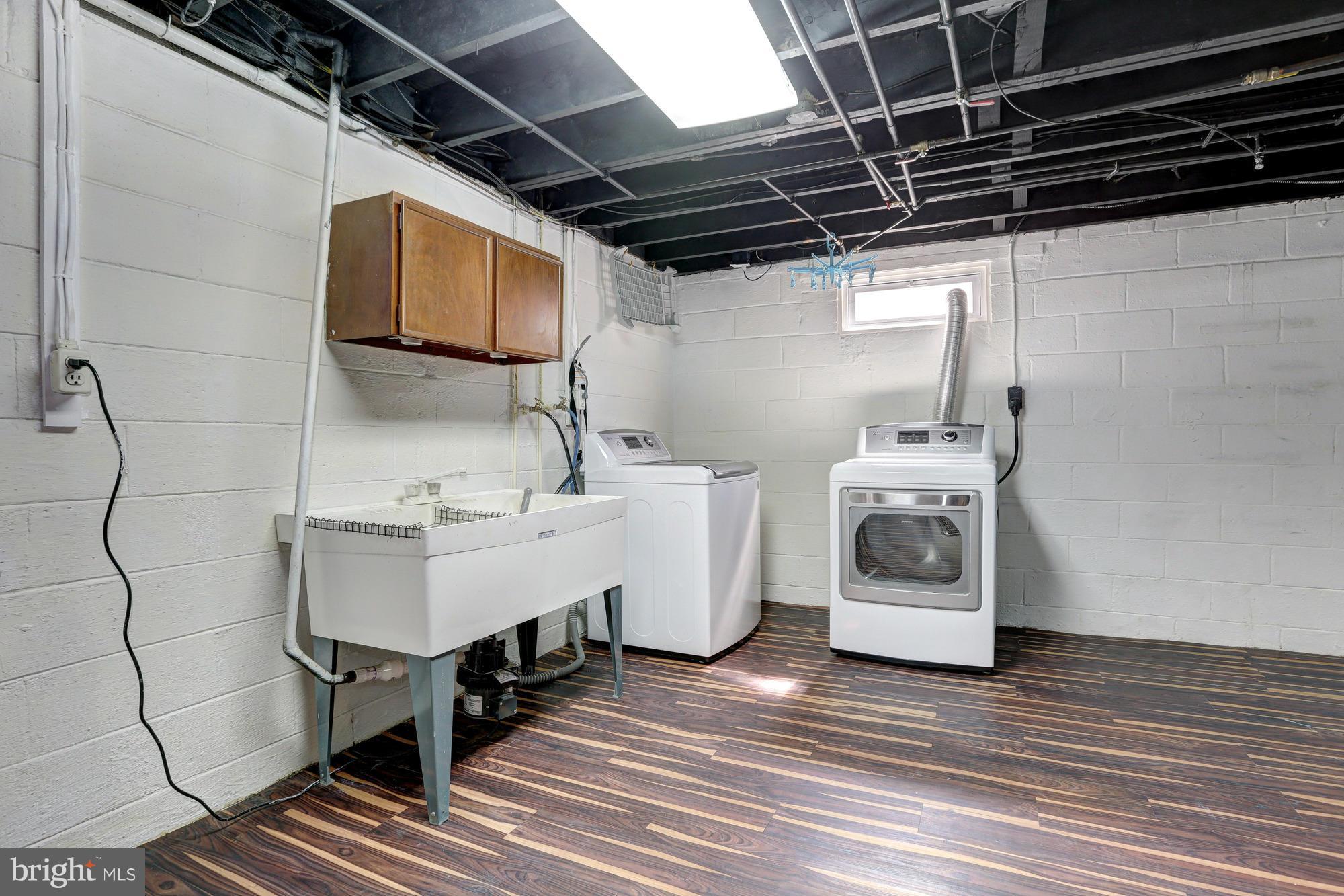 16921 Oak Hill Road Silver Spring, MD 20905 - Photo 21 of 30 Large laundry room