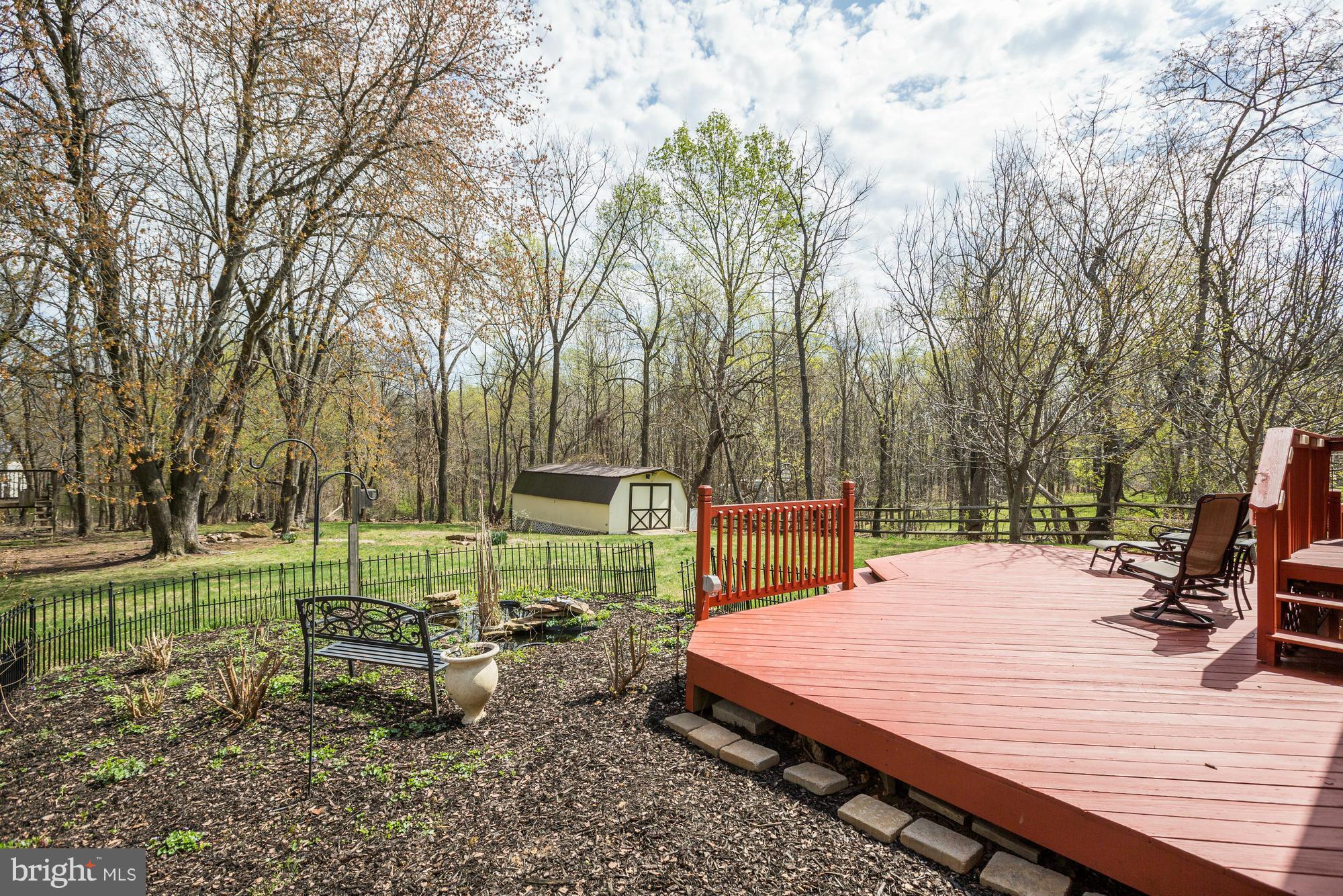 16921 Oak Hill Road Silver Spring, MD 20905 - Photo 24 of 30 Lovely large deck off kitchen sliders