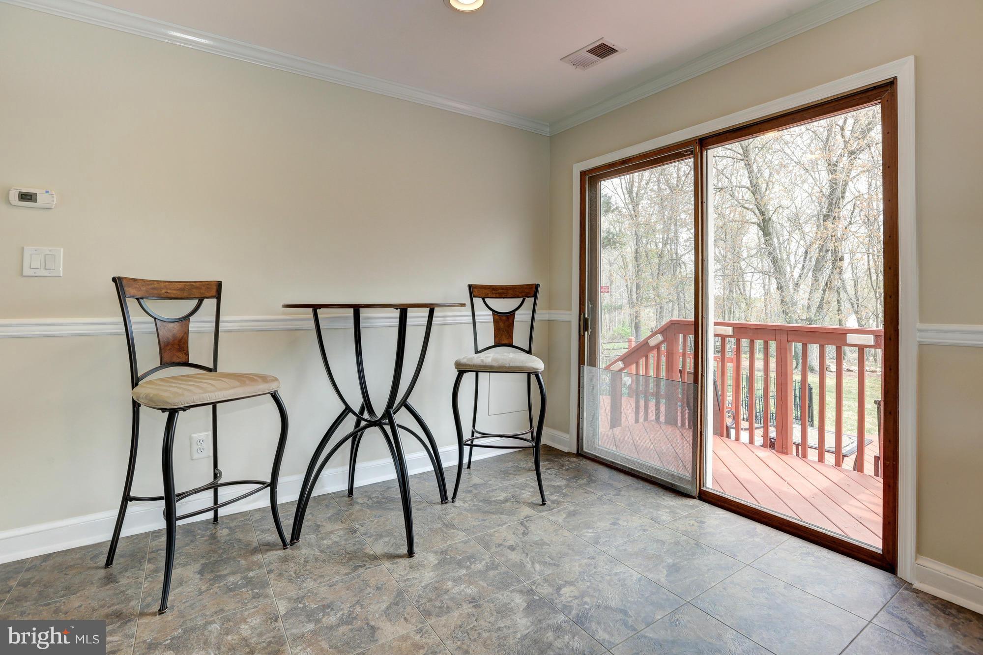 16921 Oak Hill Road Silver Spring, MD 20905 - Photo 9 of 30 Convenient sliding glass door to deck