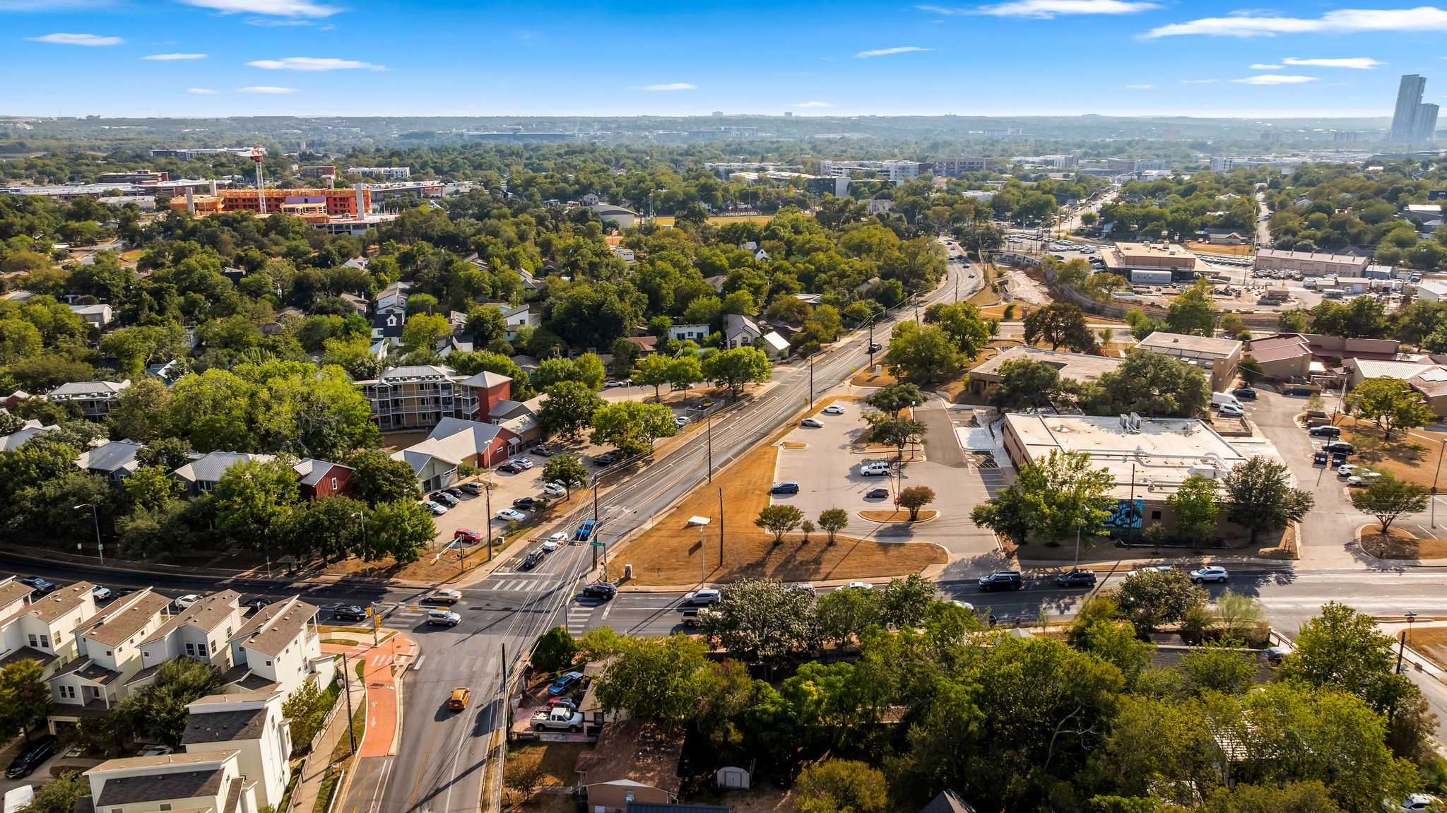 2900 Webberville Road Austin, TX 78702 - Photo 14 of 22 An aerial perspective captures the vibrant neighborhood layout and surrounding urban landscape.