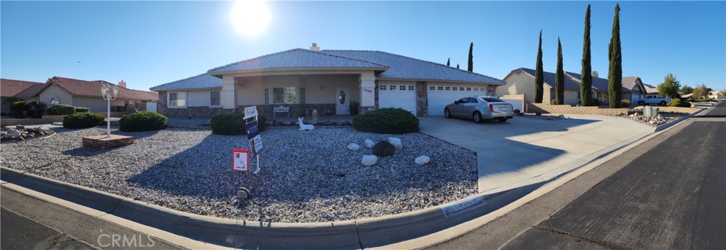 13504 Choco Road Apple Valley, CA 92308 - Photo 1 of 1 a view of a house with a bath tub and sitting space
