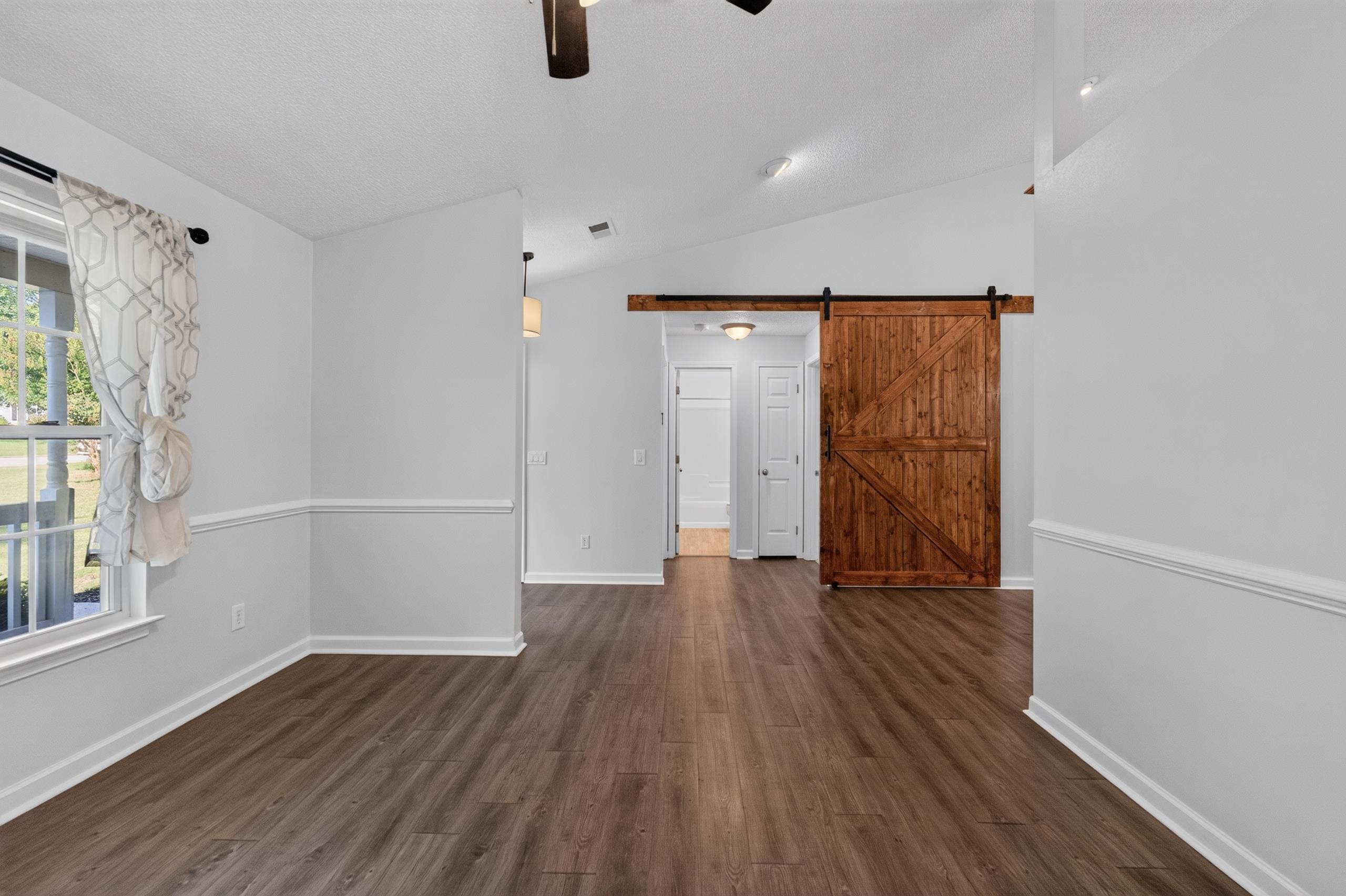 20 Two Gait Lane Simpsonville, SC 29680 - Photo 23 of 50 Stylish Barn Door Feature
