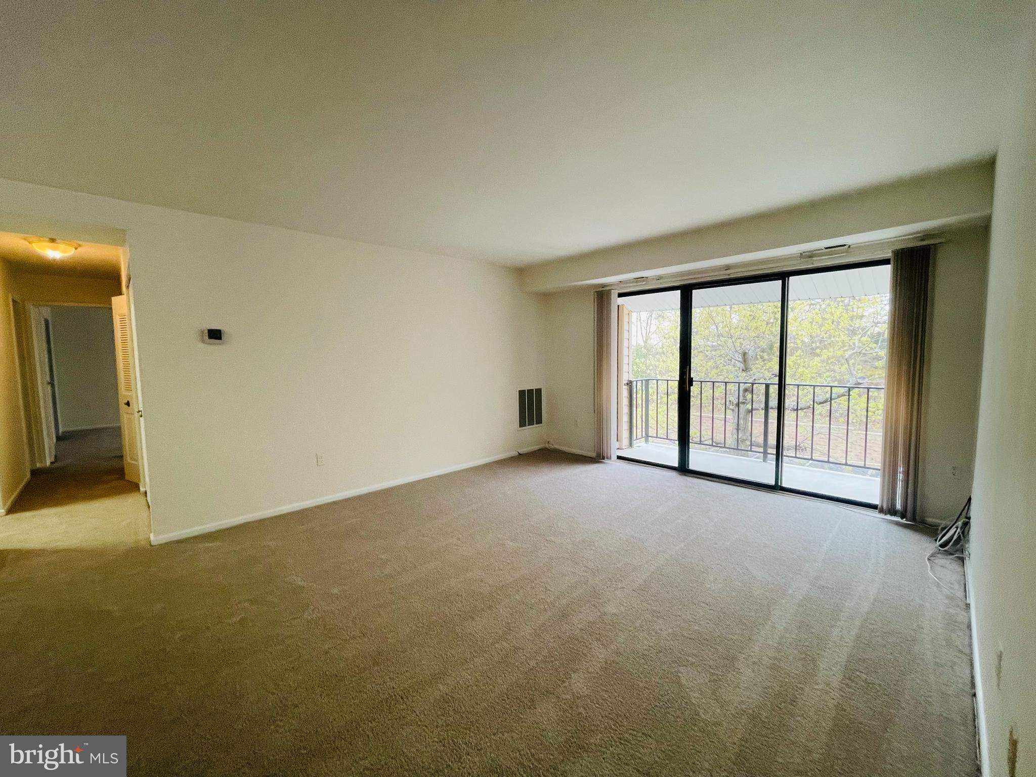 2570 Riva Road, Unit 15C Annapolis, MD 21401 - Photo 5 of 15 Living Room w access to balcony