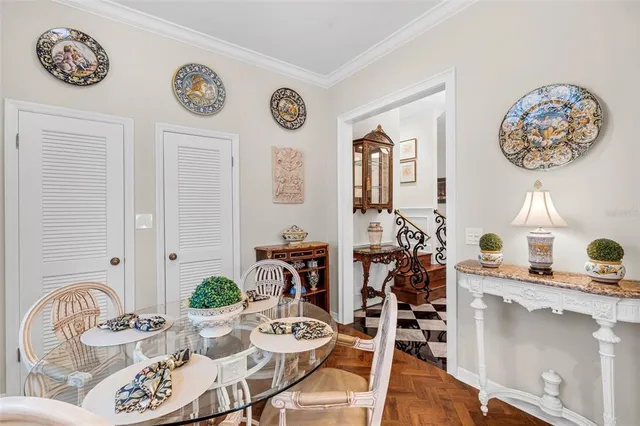 a view of a livingroom with furniture and a mirror