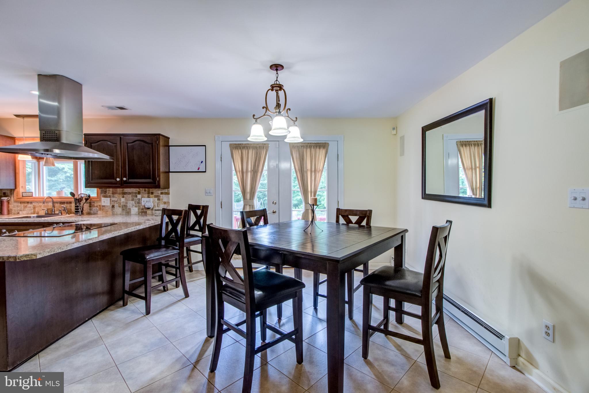 18 Assiscunk Drive Columbus, NJ 08022 - Photo 12 of 36 Dining Area leads to outside Deck w French Doors