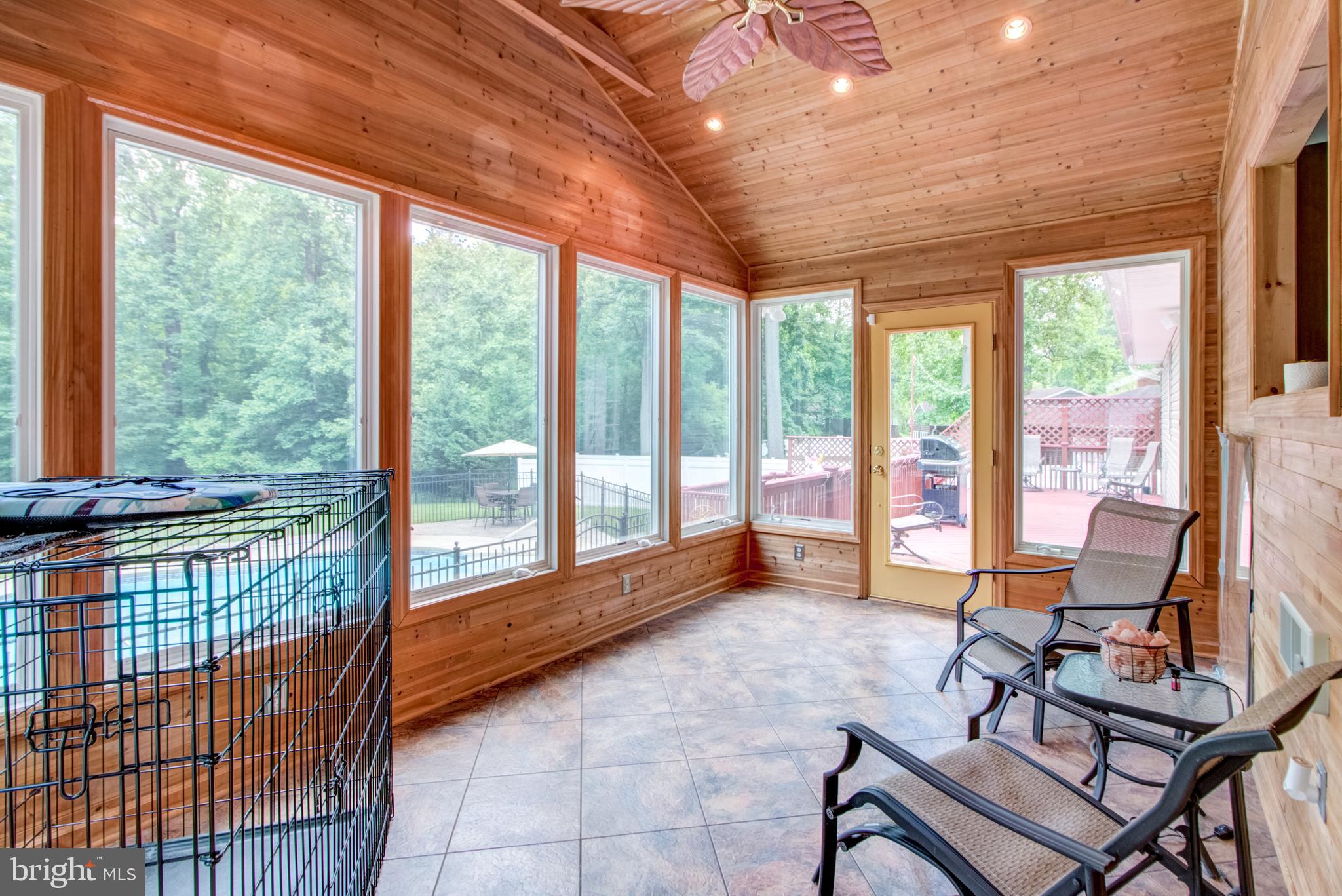 18 Assiscunk Drive Columbus, NJ 08022 - Photo 28 of 36 Sun Room Doors to Deck & Paver Walk way to Pool