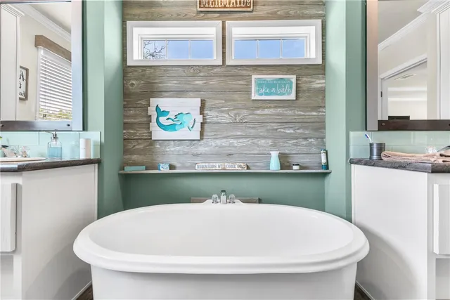 a bathroom with a sink and a microwave