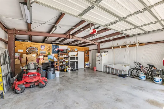a view of a garage with furniture