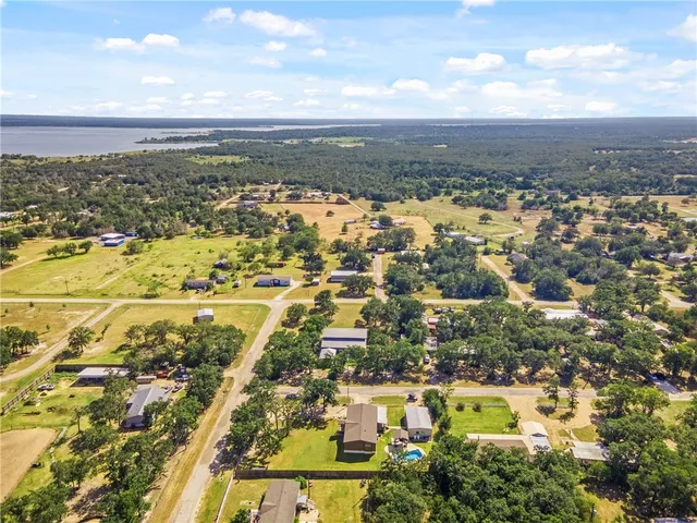 an aerial view of residential building and ocean