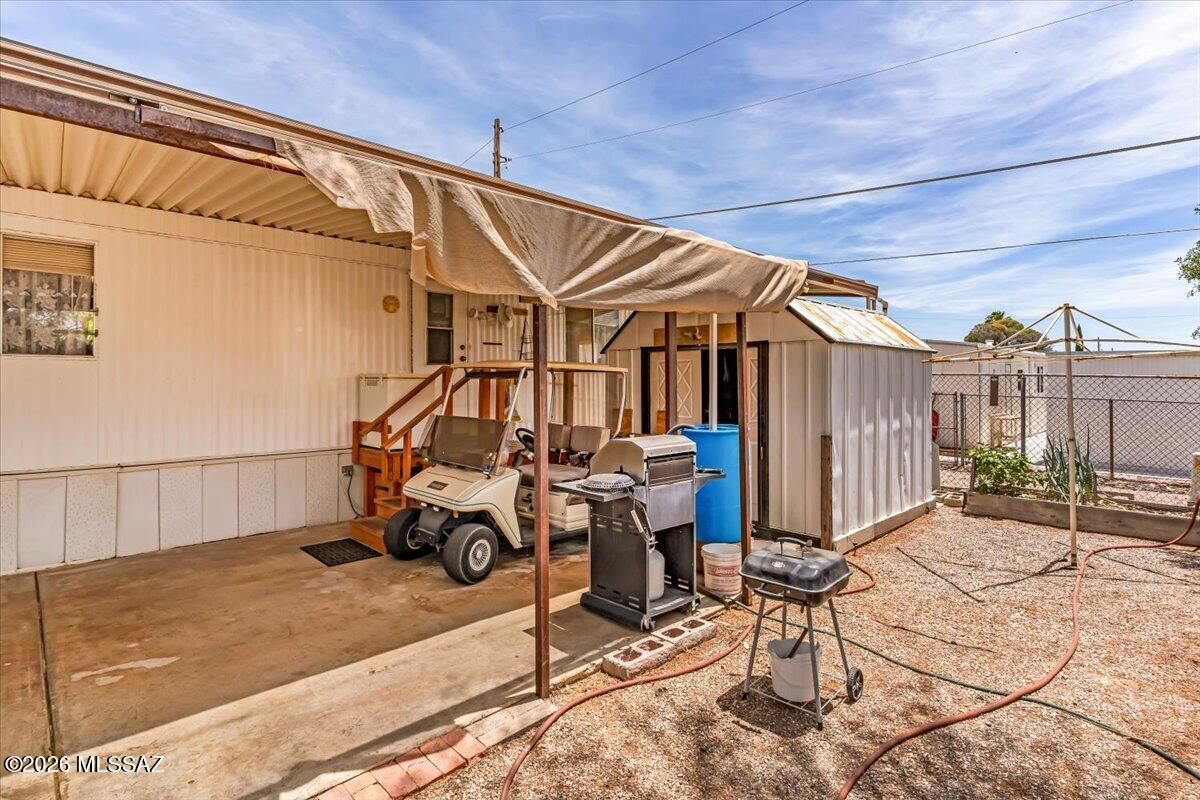 5379 West Rafter Cir Street Tucson, AZ 85713 - Photo 38 of 38 a view of a patio with table and chairs