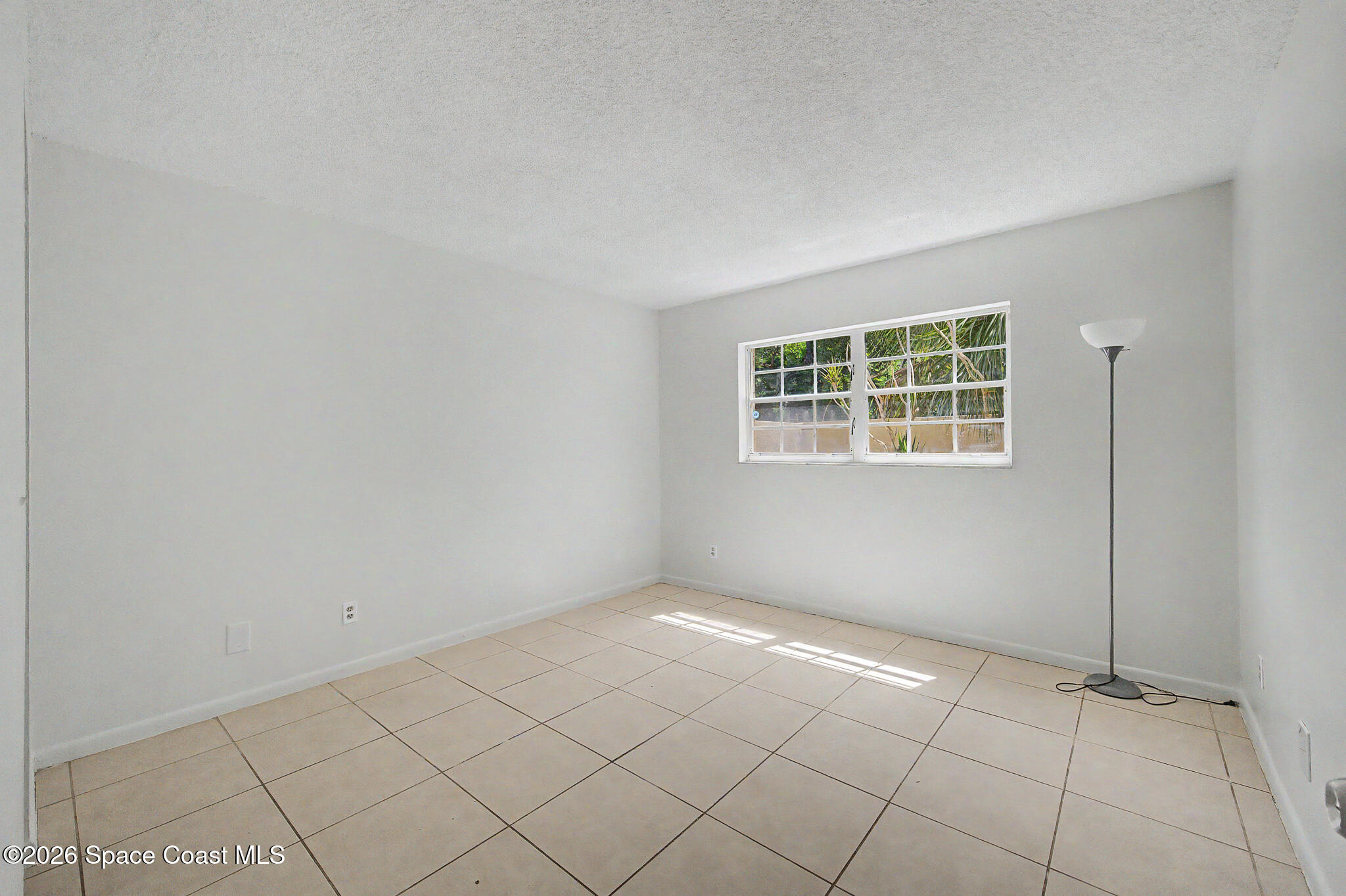 1641 Sunny Brook Lane, Unit C104 Palm Bay, FL 32905 - Photo 16 of 37 Primary Bedroom