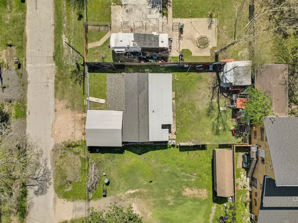 a aerial view of a house with swimming pool