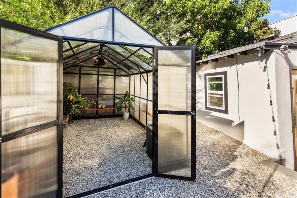2207-2009 Apex Avenue Los Angeles, CA 90039 - Photo 32 of 64 Looking inside the greenhouse. What would you want to plant in this modern greenhouse?