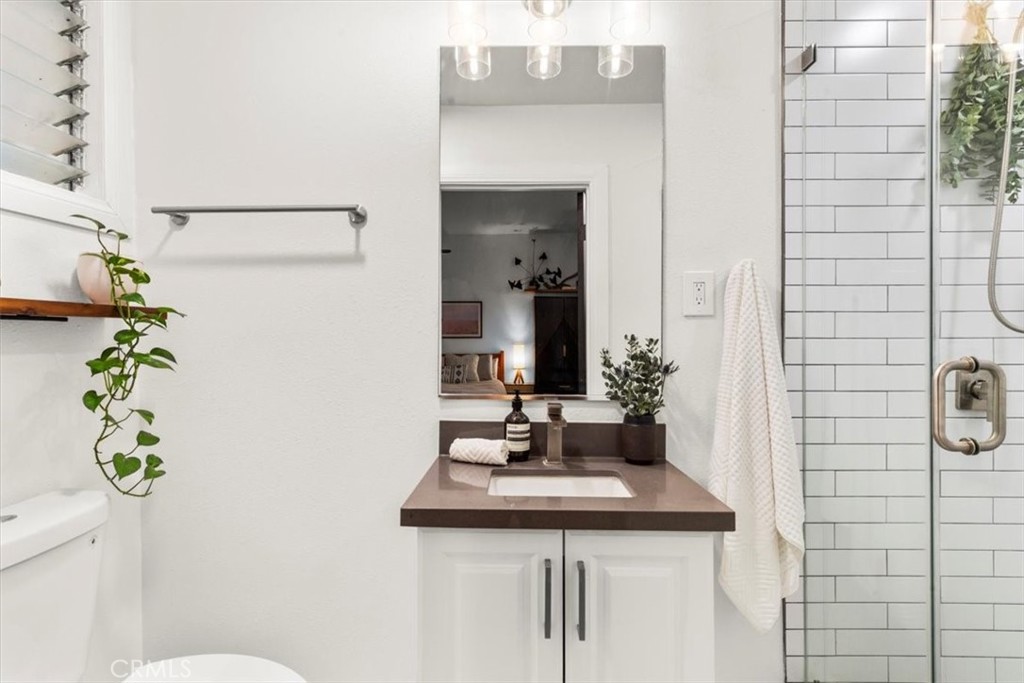 2207-2009 Apex Avenue Los Angeles, CA 90039 - Photo 40 of 64 Newly remodeled bathroom with subway titles, vanity, rainfall shower head and newer fixtures.