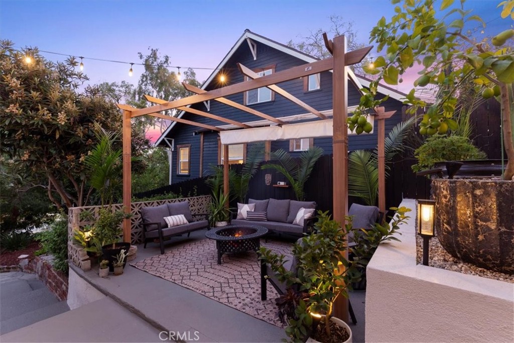 2207-2009 Apex Avenue Los Angeles, CA 90039 - Photo 54 of 64 Fire pit area has a pergola with a option to keep it open and airy or shaded and cooler.