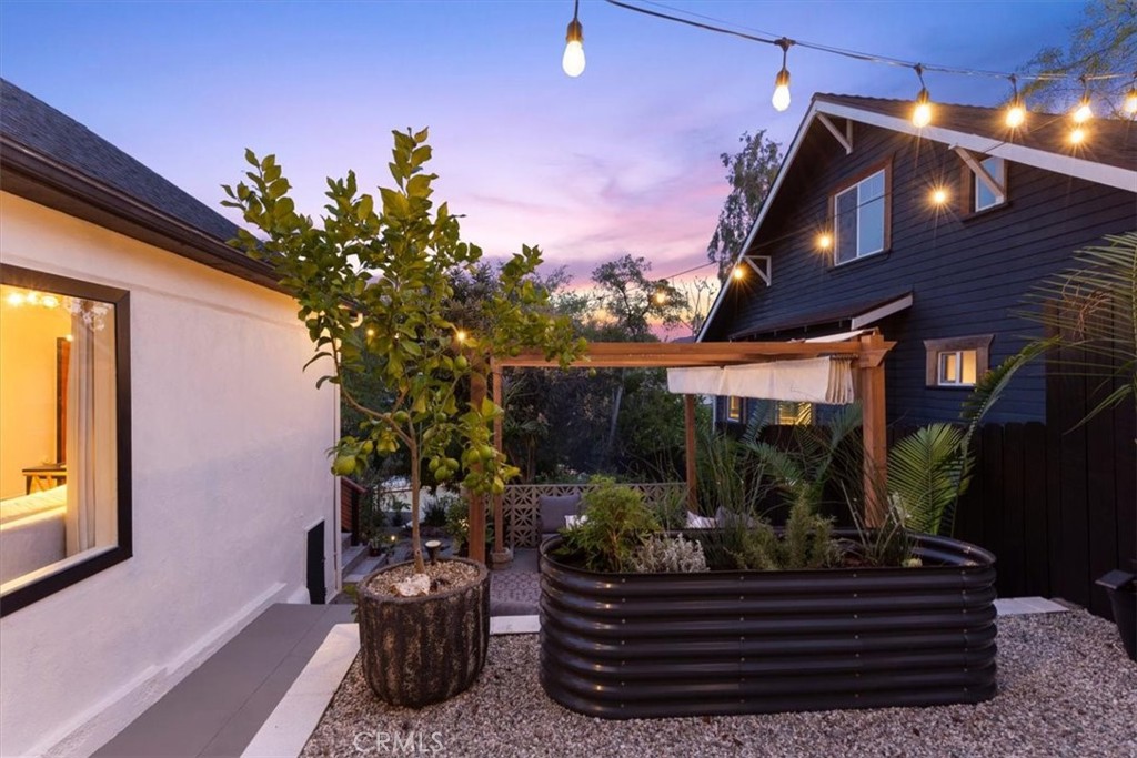 2207-2009 Apex Avenue Los Angeles, CA 90039 - Photo 56 of 64 Black garden bed with edible herbs and succulents.