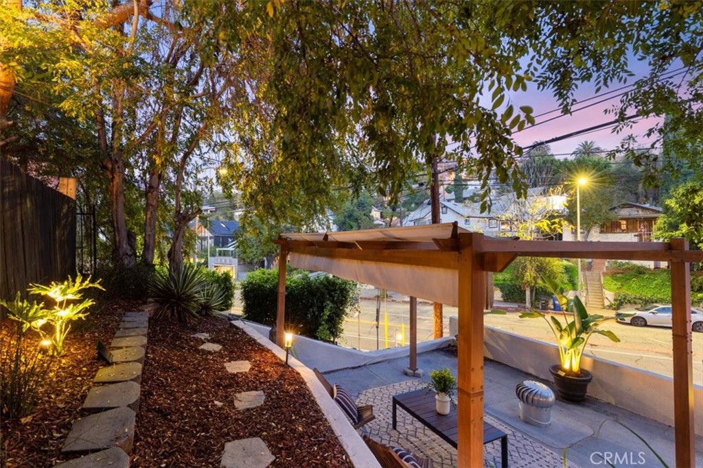 2207-2009 Apex Avenue Los Angeles, CA 90039 - Photo 59 of 64 Just the right lighting at dusk on the rooftop of the garage. Perfect for evening meals, deep conversations or dessert.