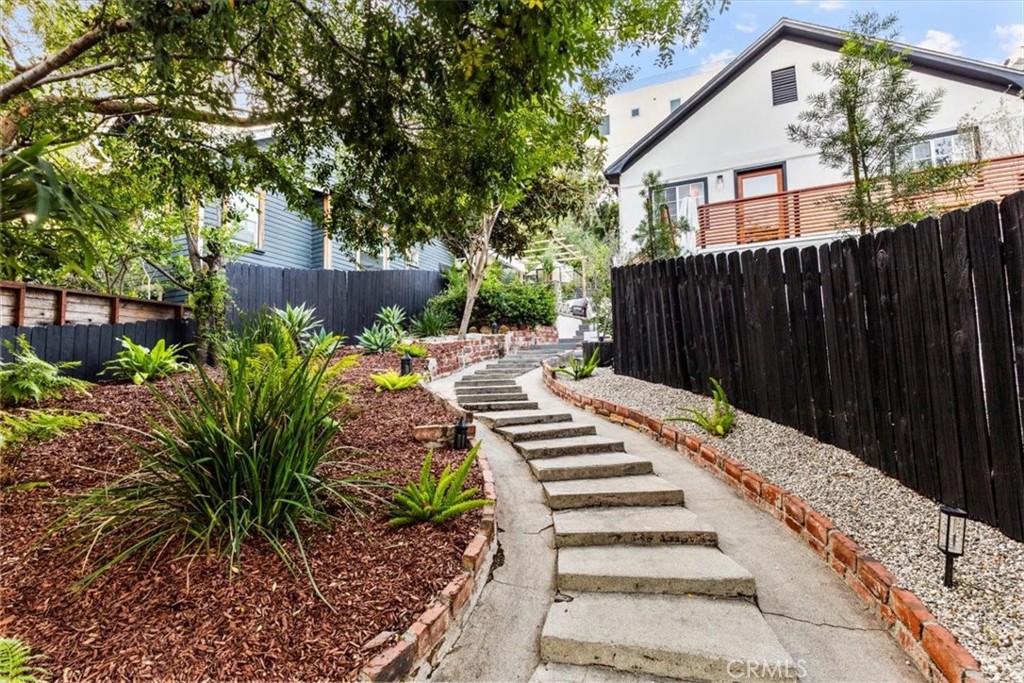 2207-2009 Apex Avenue Los Angeles, CA 90039 - Photo 6 of 64 Curved stairways really makes for a dreamy entrance.