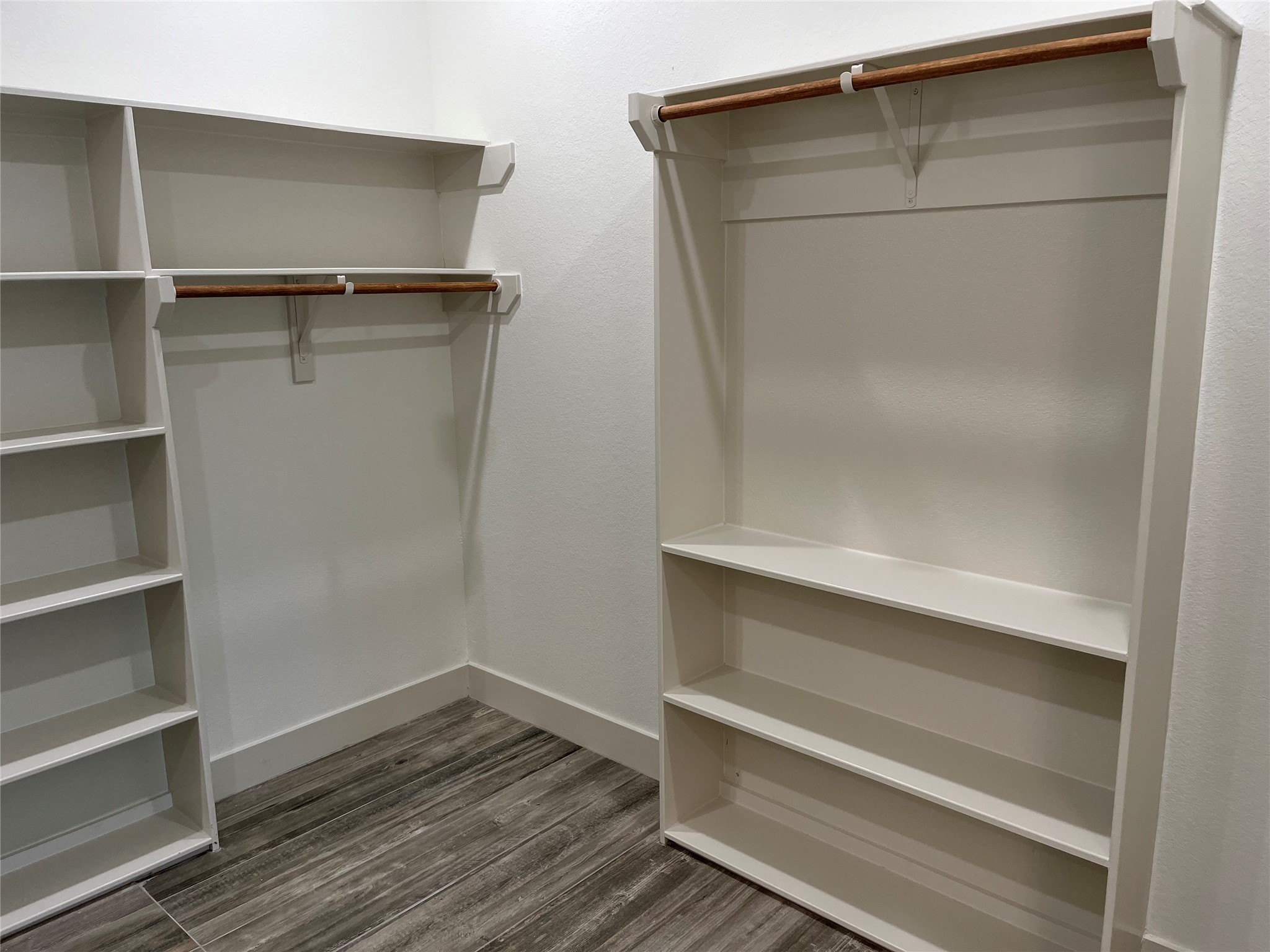 2291 Riverside Drive West Columbia, TX 77486 - Photo 14 of 50 a view of walk in closet with empty racks