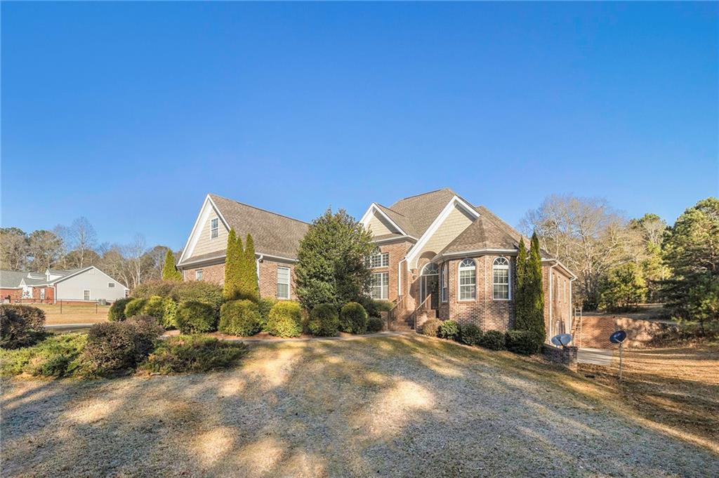 485 Stewart Road Covington, GA 30016 - Photo 1 of 1 a view of a house with a outdoor space