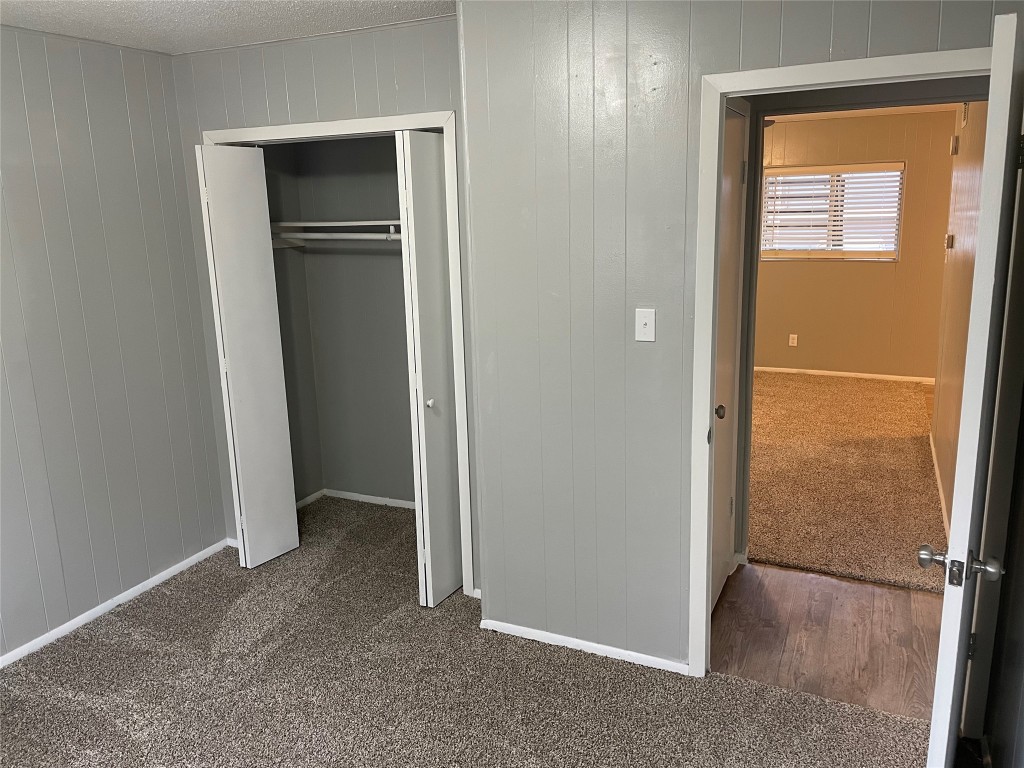 1209 Vance Street, Unit 30 Taylor, TX 76574 - Photo 12 of 35 a view of an empty room with closet and a window