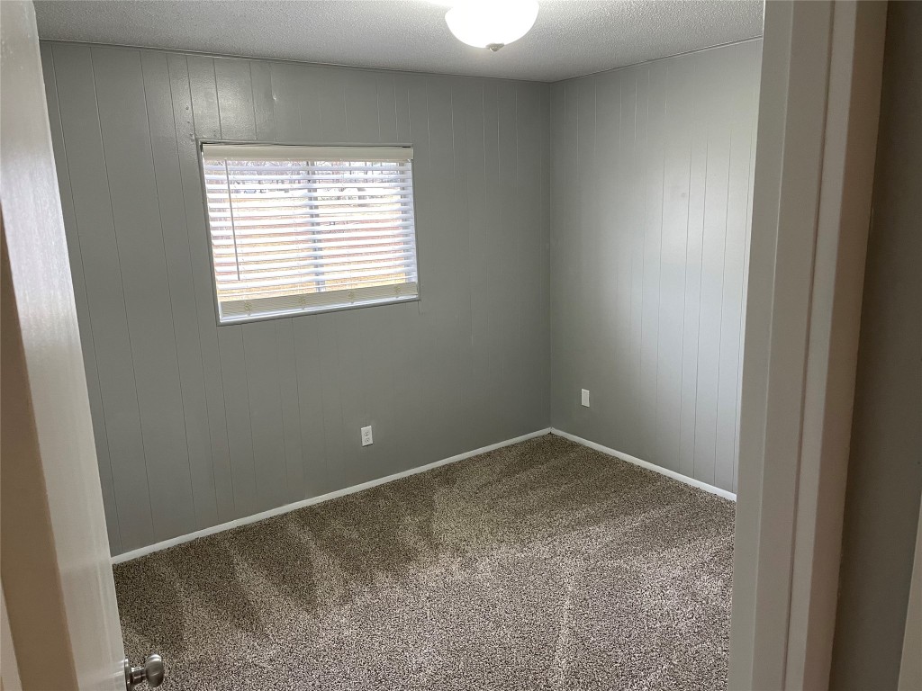 1209 Vance Street, Unit 30 Taylor, TX 76574 - Photo 13 of 35 an empty room with a window