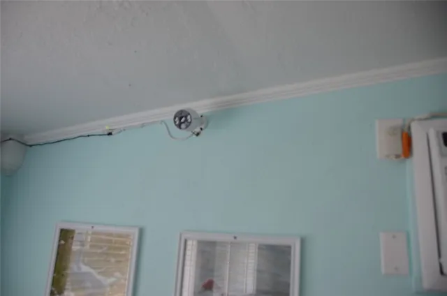 a view of small space with racks on the wall