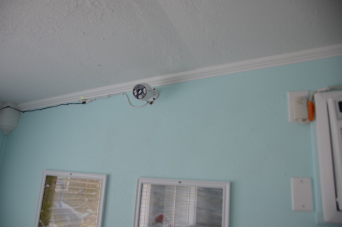 1209 Vance Street, Unit 30 Taylor, TX 76574 - Photo 17 of 35 a view of small space with racks on the wall