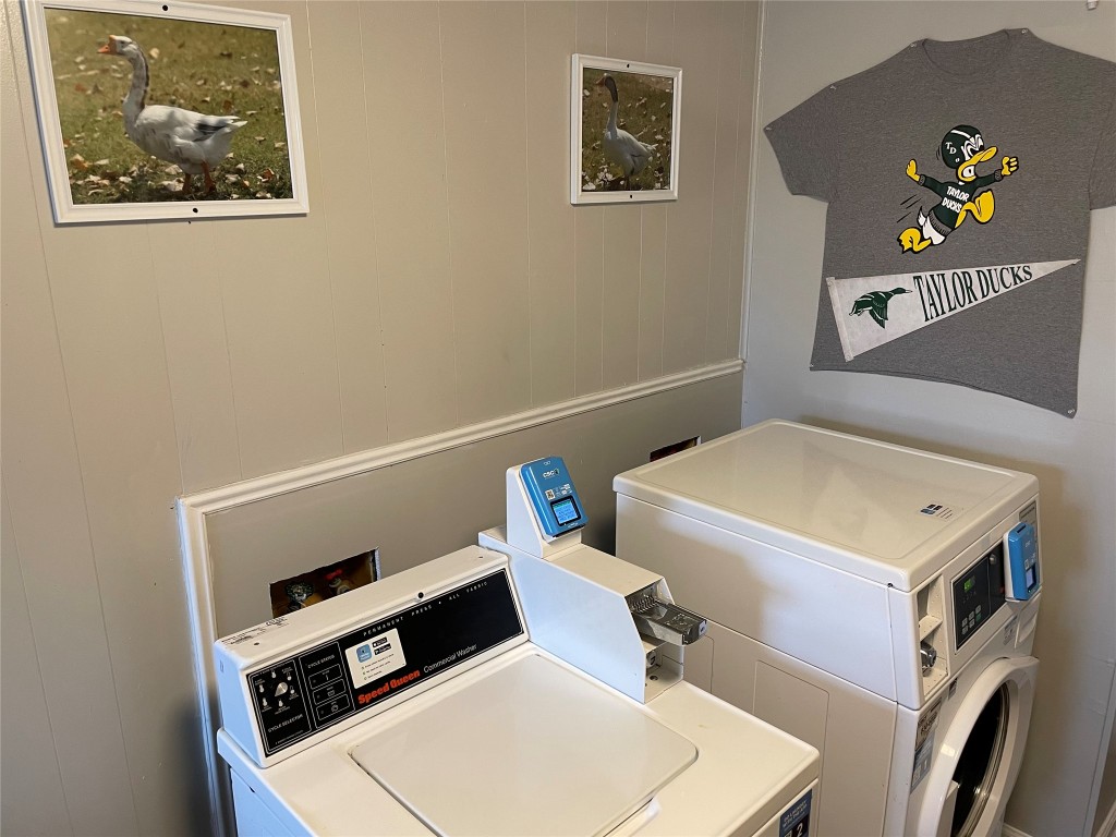 1209 Vance Street, Unit 30 Taylor, TX 76574 - Photo 18 of 35 a utility room with dryer and washer