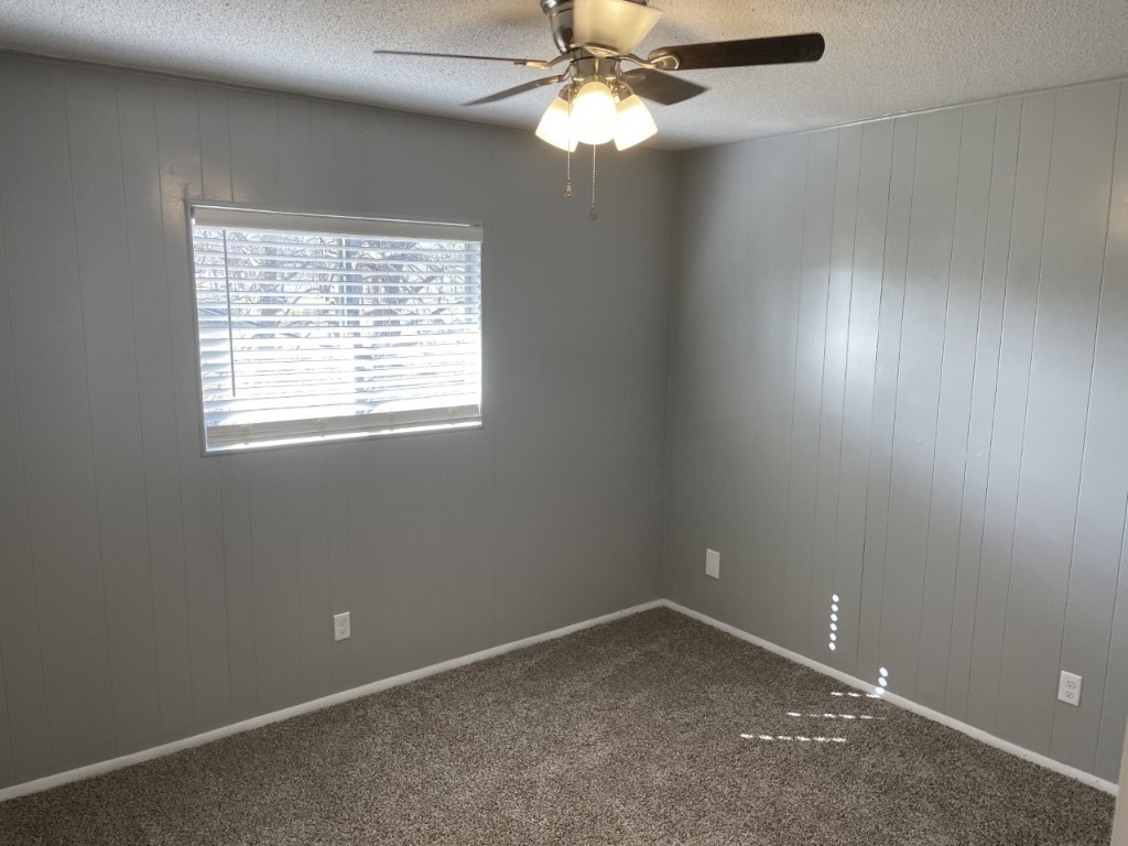 1209 Vance Street, Unit 30 Taylor, TX 76574 - Photo 29 of 35 an empty room with a window