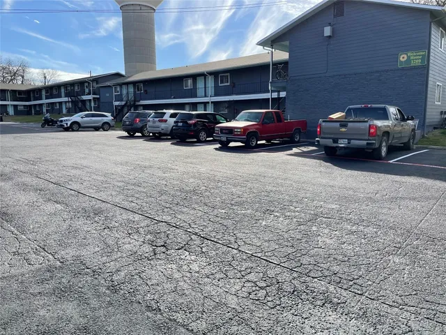 a car parked in front of a building