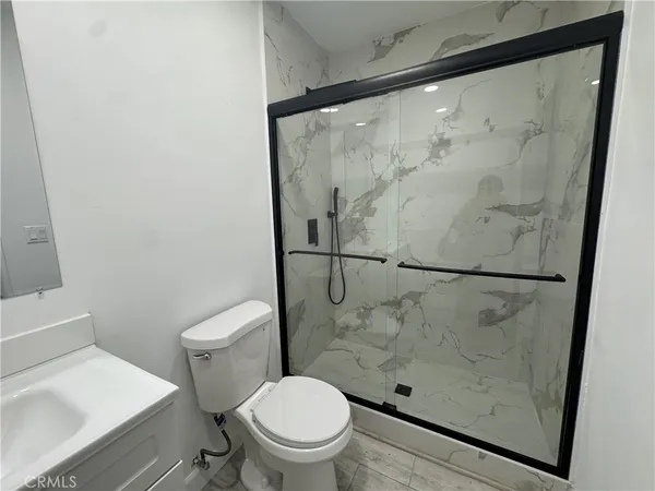 a sink and a toilet in a bathroom