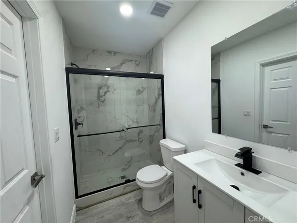 a view of a utility room with a door