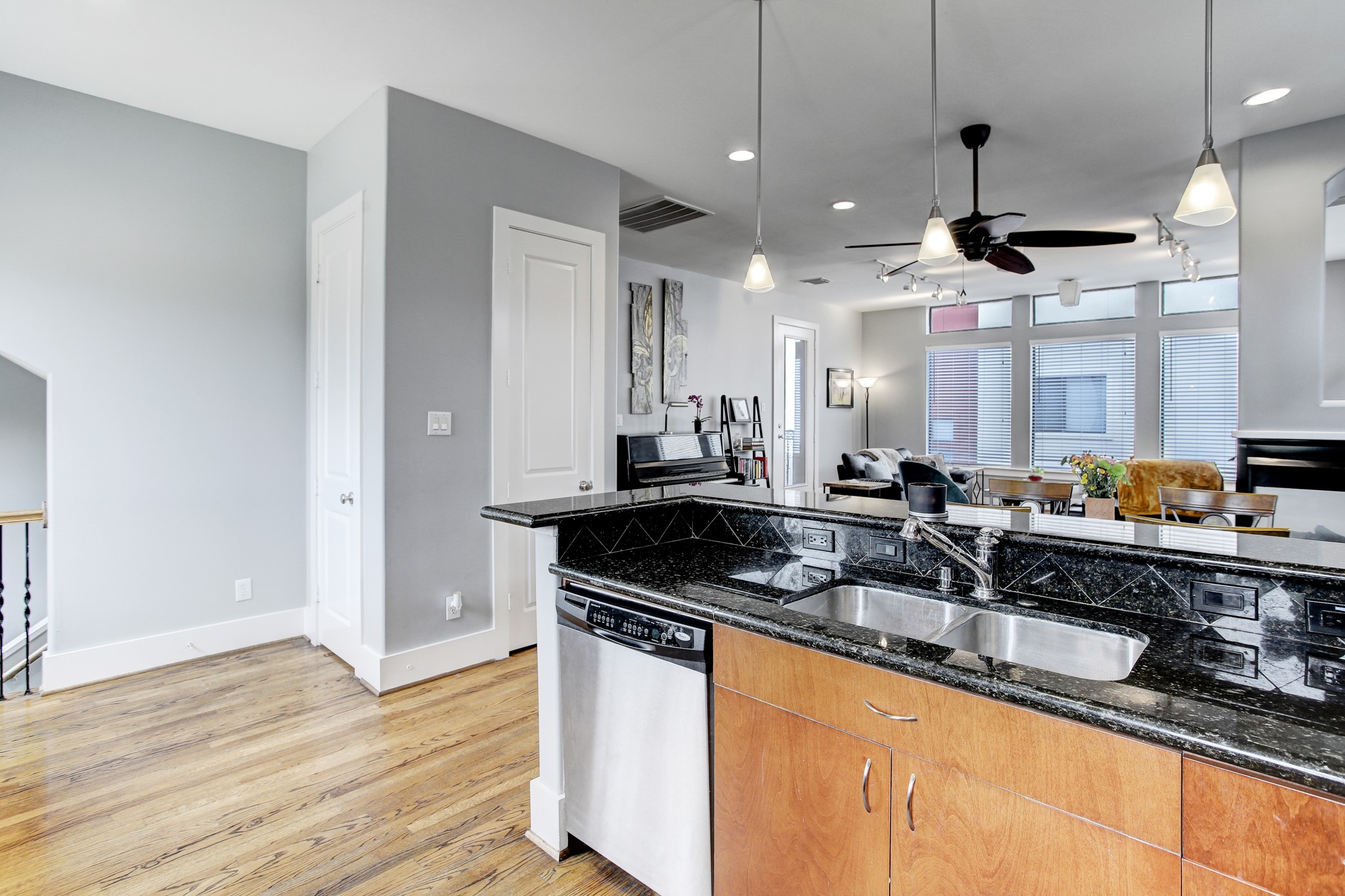 408 Parker Street Houston, TX 77007 - Photo 9 of 27 a kitchen with granite countertop a sink cabinets and wooden floor
