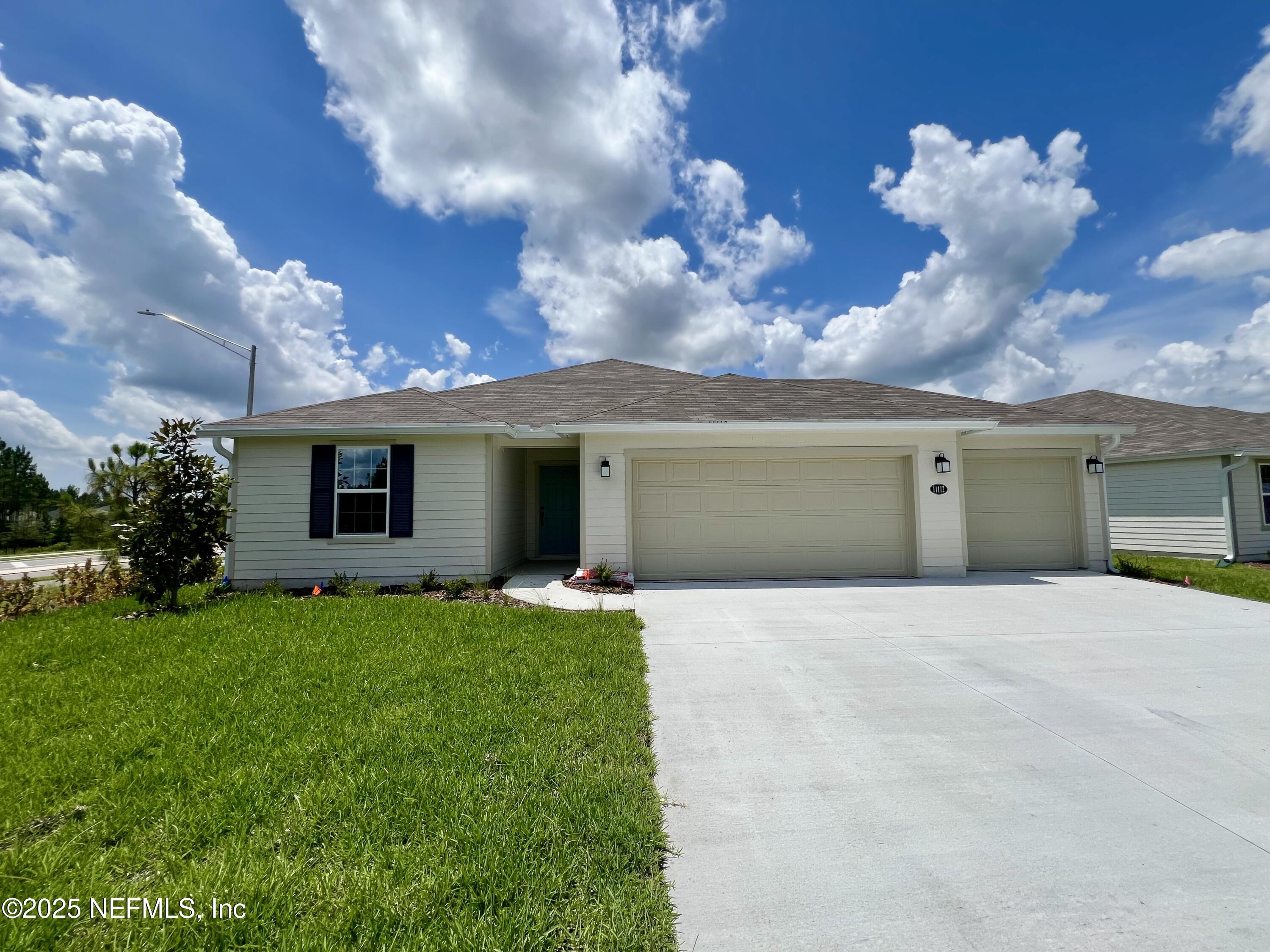 11112 Spg Mdws Road Jacksonville, FL 32222 - Photo 1 of 17 FRONT